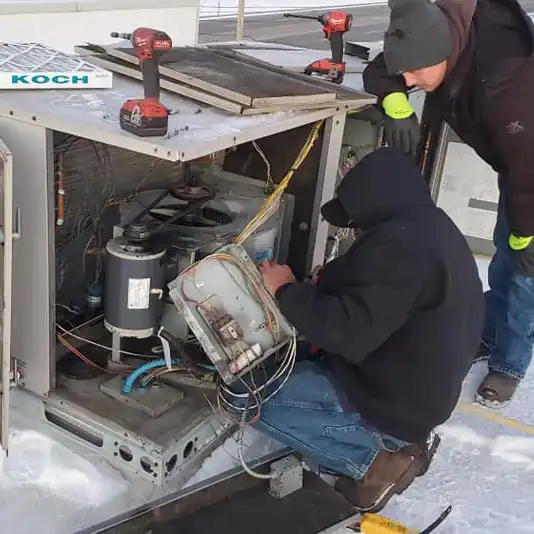 maintenance_on_rooftop_hvac_unit Expert Commercial HVAC & R service and repairs